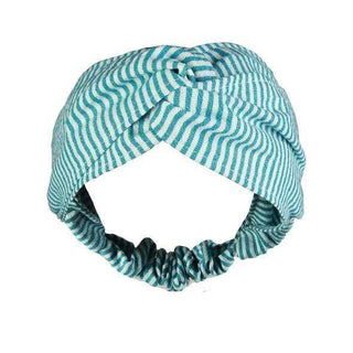 This turban-inspired, twisted, fabric covered elastic headband is 100% made by cotton and handwoven by local artisans in Mexico. To manufacture our headbands Santa Lupita reuses fabric residuals of old collections in order to avoid the waste of resources. It’s available in one universal size, its elasticity offers great size adaptability.